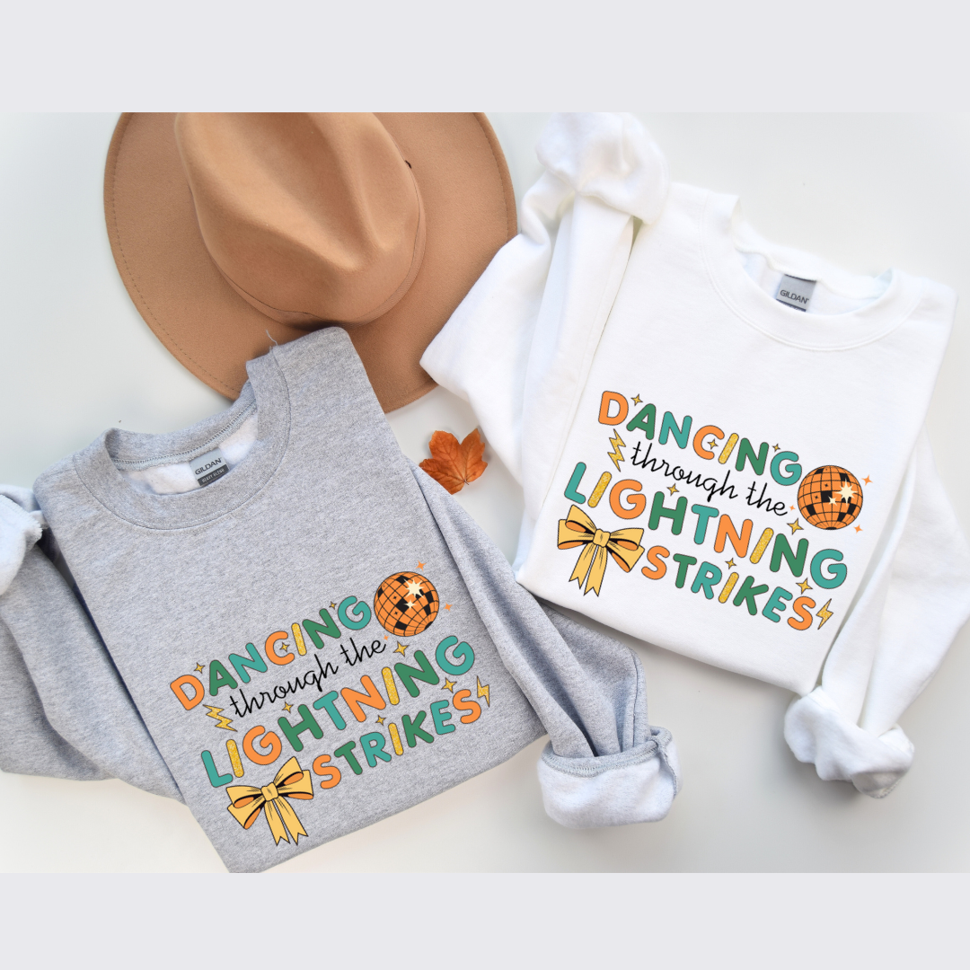 Dancing Through The Lightning Strikes Kids Tees/Crewnecks