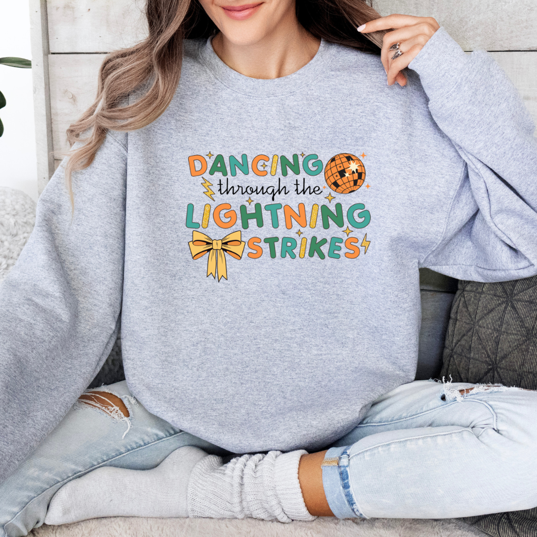 Dancing Through The Lightning Strikes Tees/Crewnecks/Hoodies