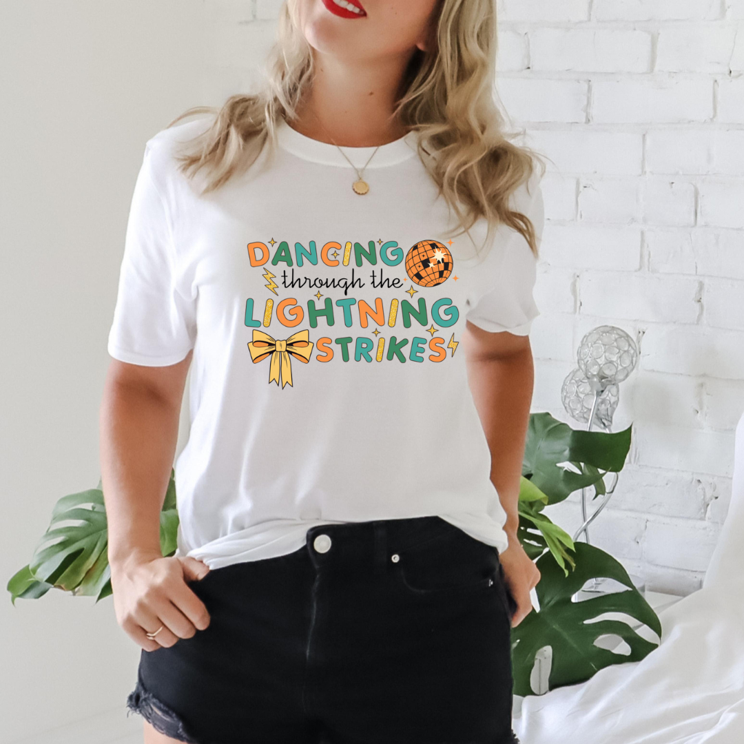 Dancing Through The Lightning Strikes Tees/Crewnecks/Hoodies