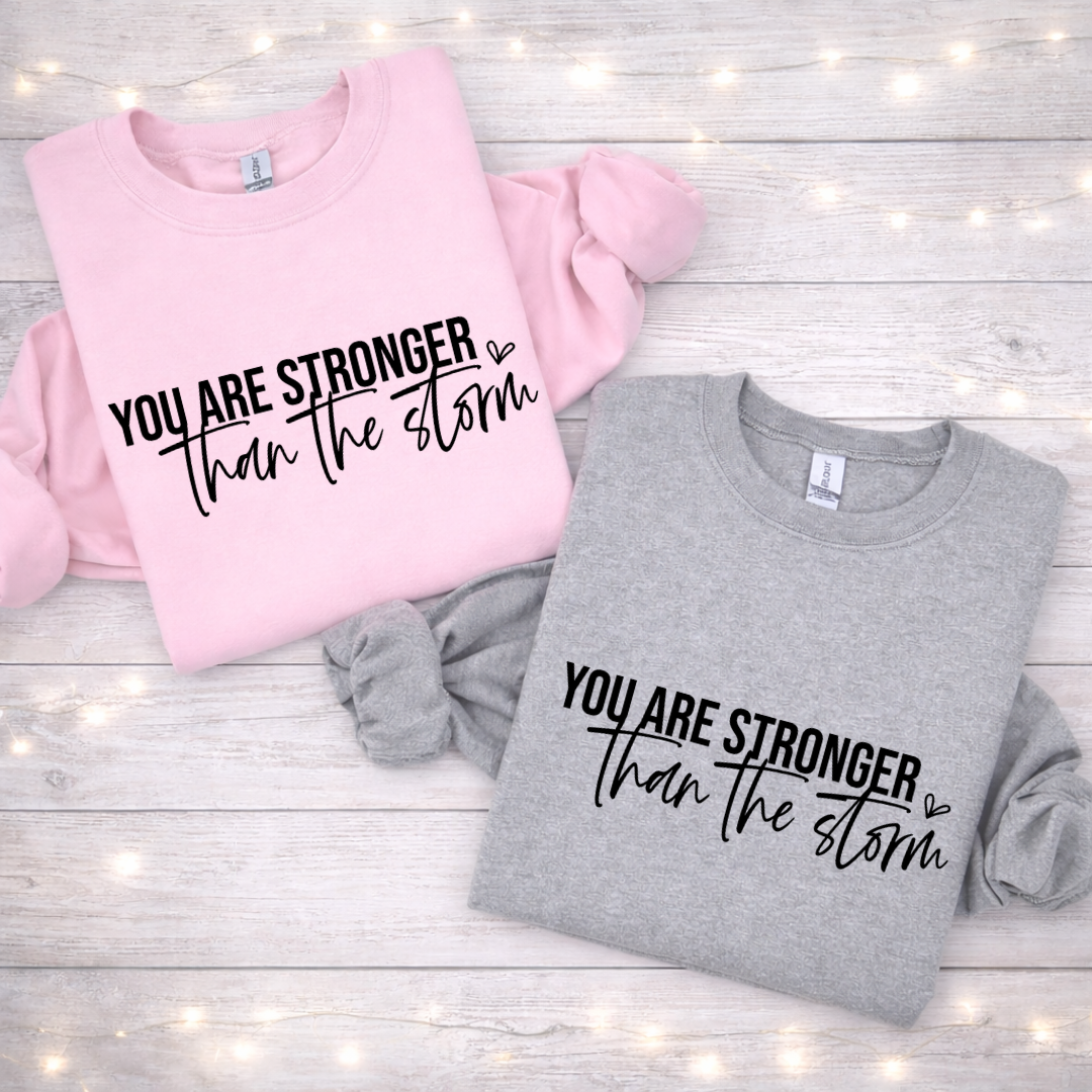 Stronger Than The Storm Tees/Crewnecks/Hoodies